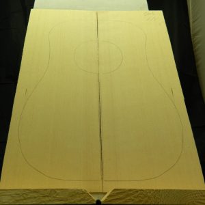 Sitka Dreadnaught-Jumbo guitar top with pencil outline on joined spruce planks.