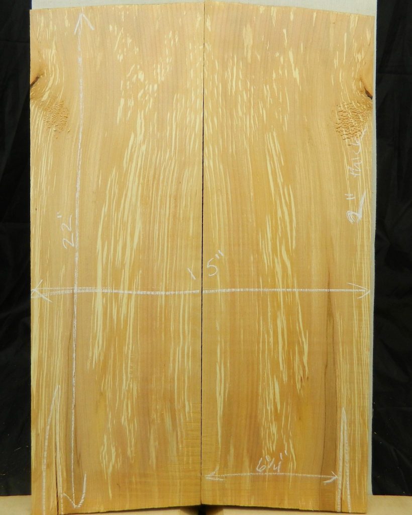 Spalted Red Alder guitar body bookset with quartersawn grain and white spalting patterns, chalk-marked dimensions.