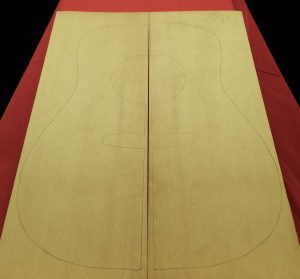 Bearclaw Dread Sitka matched soundboard panels with acoustic guitar body outline.