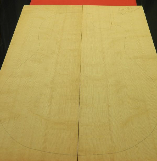 Book-matched AAA Bearclaw Sitka Spruce Cut Away Dread Top tonewood with quarter-sawn grain.