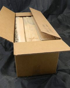 Box of sawn bracewood with old-growth Sitka Spruce pieces for luthier use.