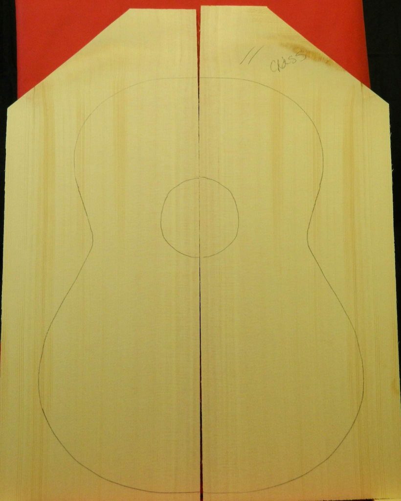 Bookmatched Classical Non-figured Sitka Spruce pieces with guitar body outline for classical guitar luthier.
