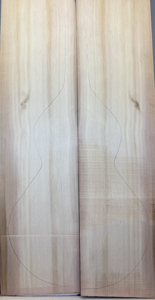 Bookmatched Western Red Cedar Weisenborn guitar top blanks with body outline for luthier construction.