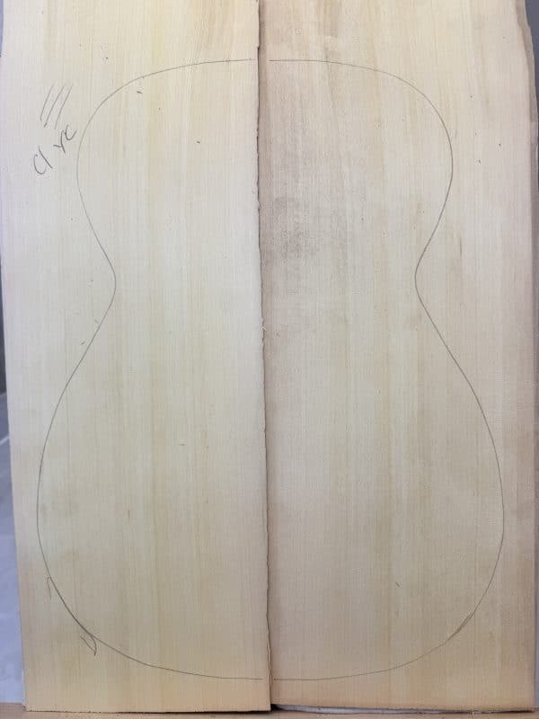 AAA Yellow Cedar Back set two quartersawn wood planks with guitar body outline for lutherie.
